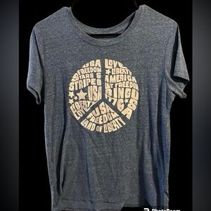 T shirt. Gray/blue and white print